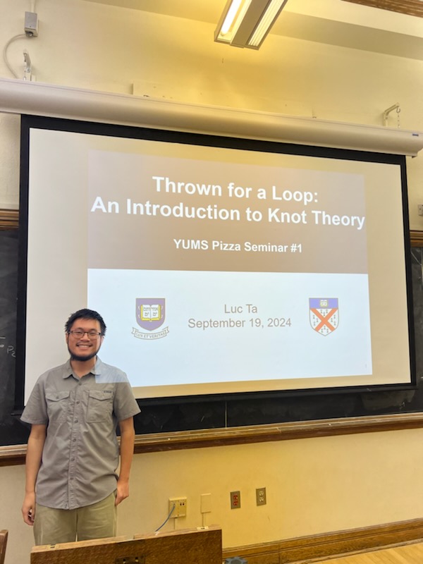 Giving a beginner-friendly presentation at Yale about knot theory and my REU research